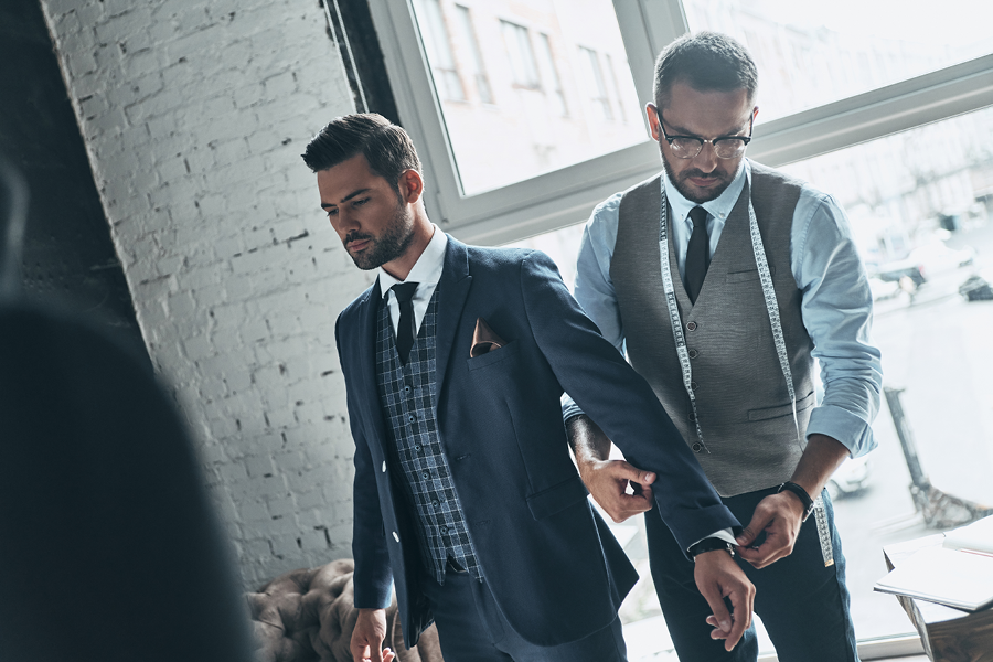 Man being fitted for a suit.