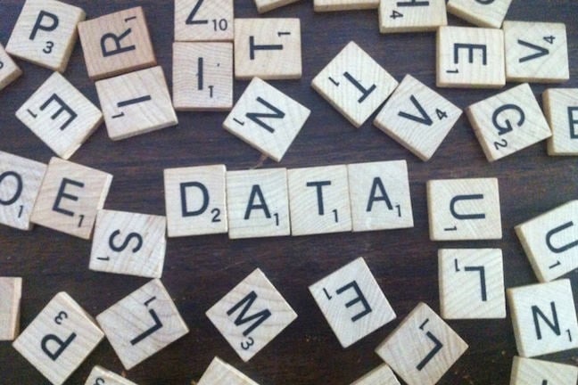 Scrabble tiles spelling the word "data".