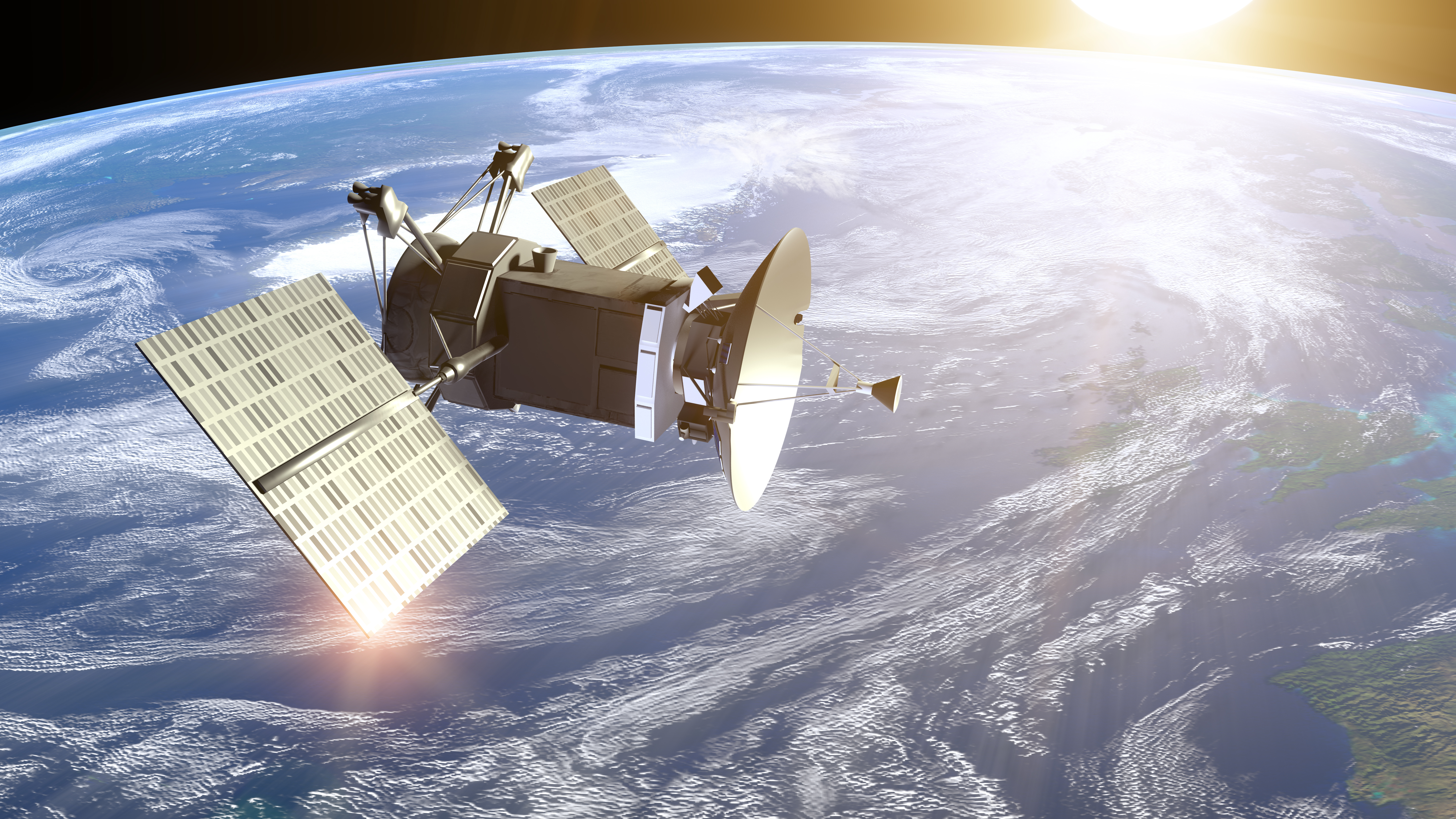 A satellite in orbit over a cloud-covered earth as viewed from space.