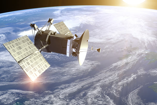 A satellite over cloud-covered earth.