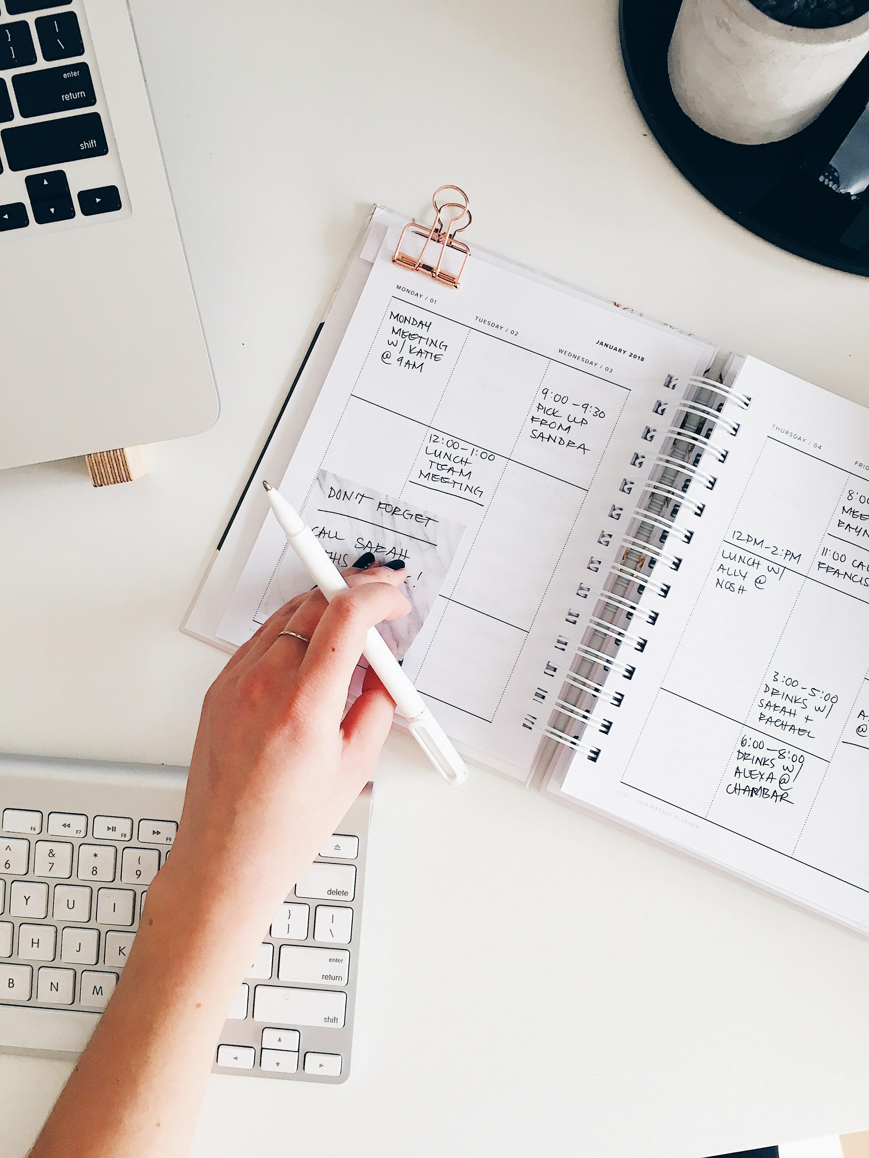 Hand writing in a planner book