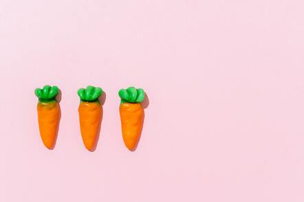a couple of carrots sitting on top of a pink surface, behance. polished, carrots