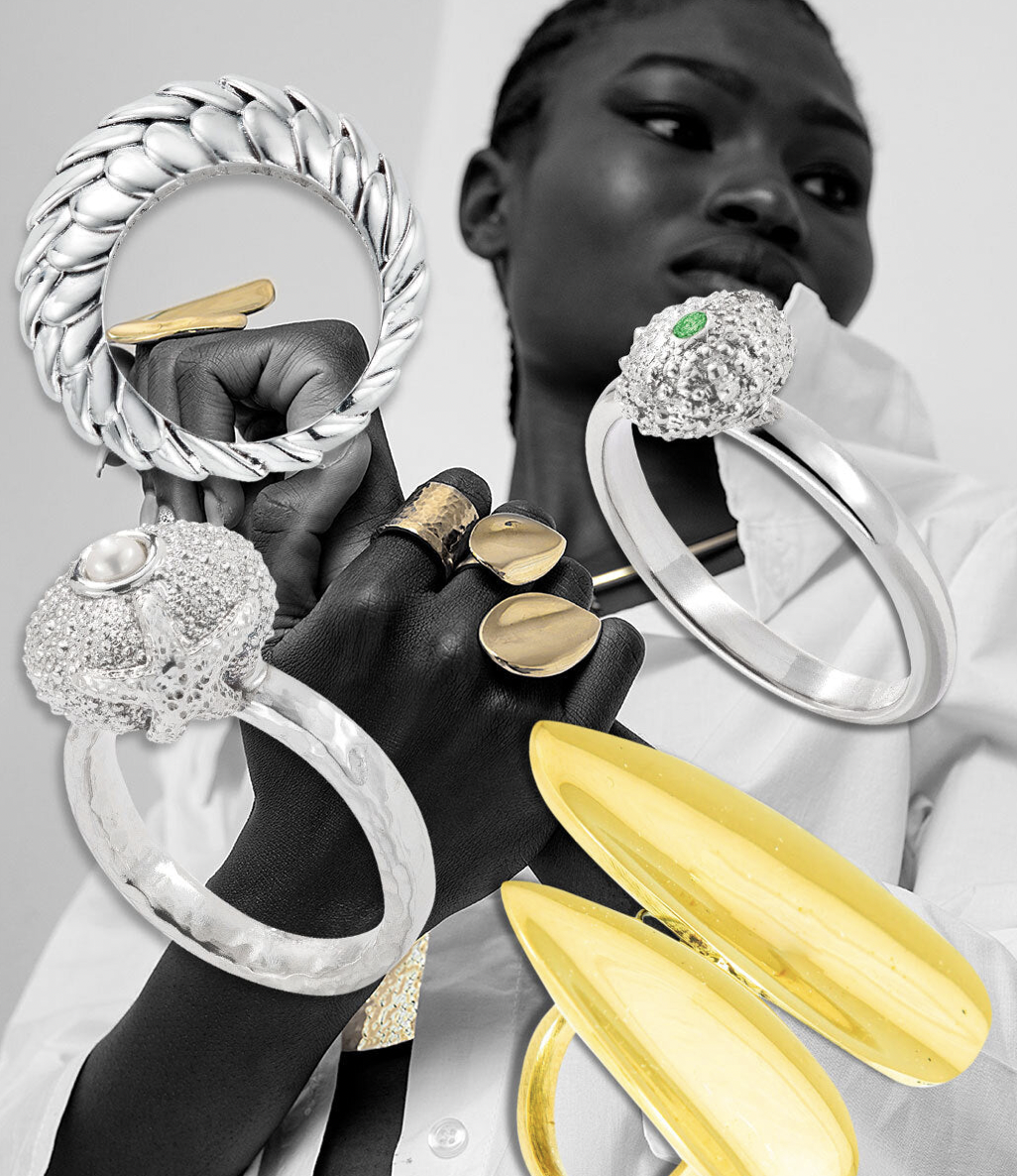 Model wearing jewellery with large pieces photoshopped across the image