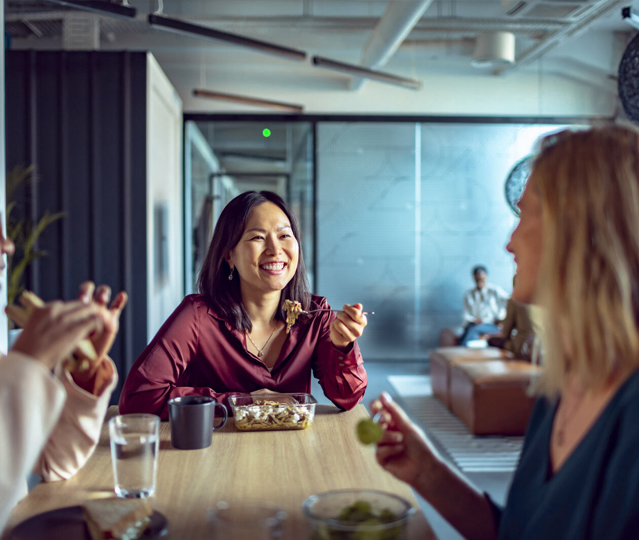 Colleagues eating lunch together