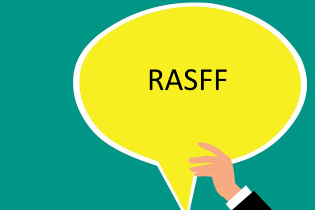Vector image of hand holding up a yellow speech bubble with "RASFF" written in it.