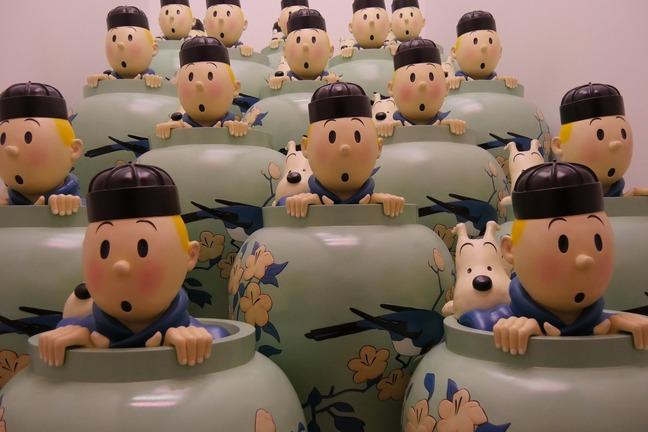 Cartoon figures of boy and dog peeping out of vases