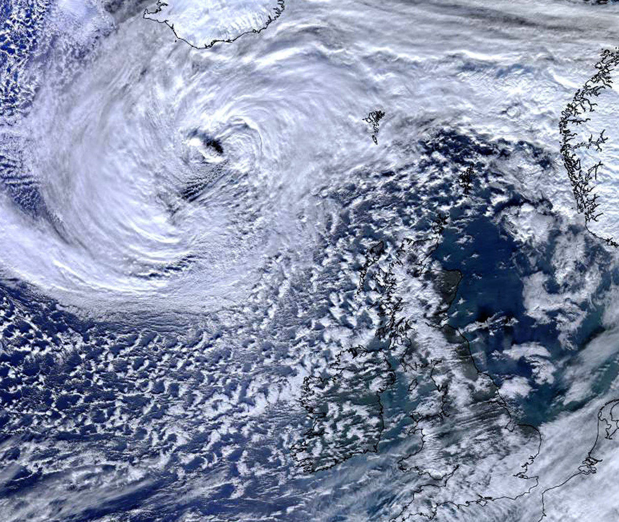 Weather: a satellite image of clouds above the earth