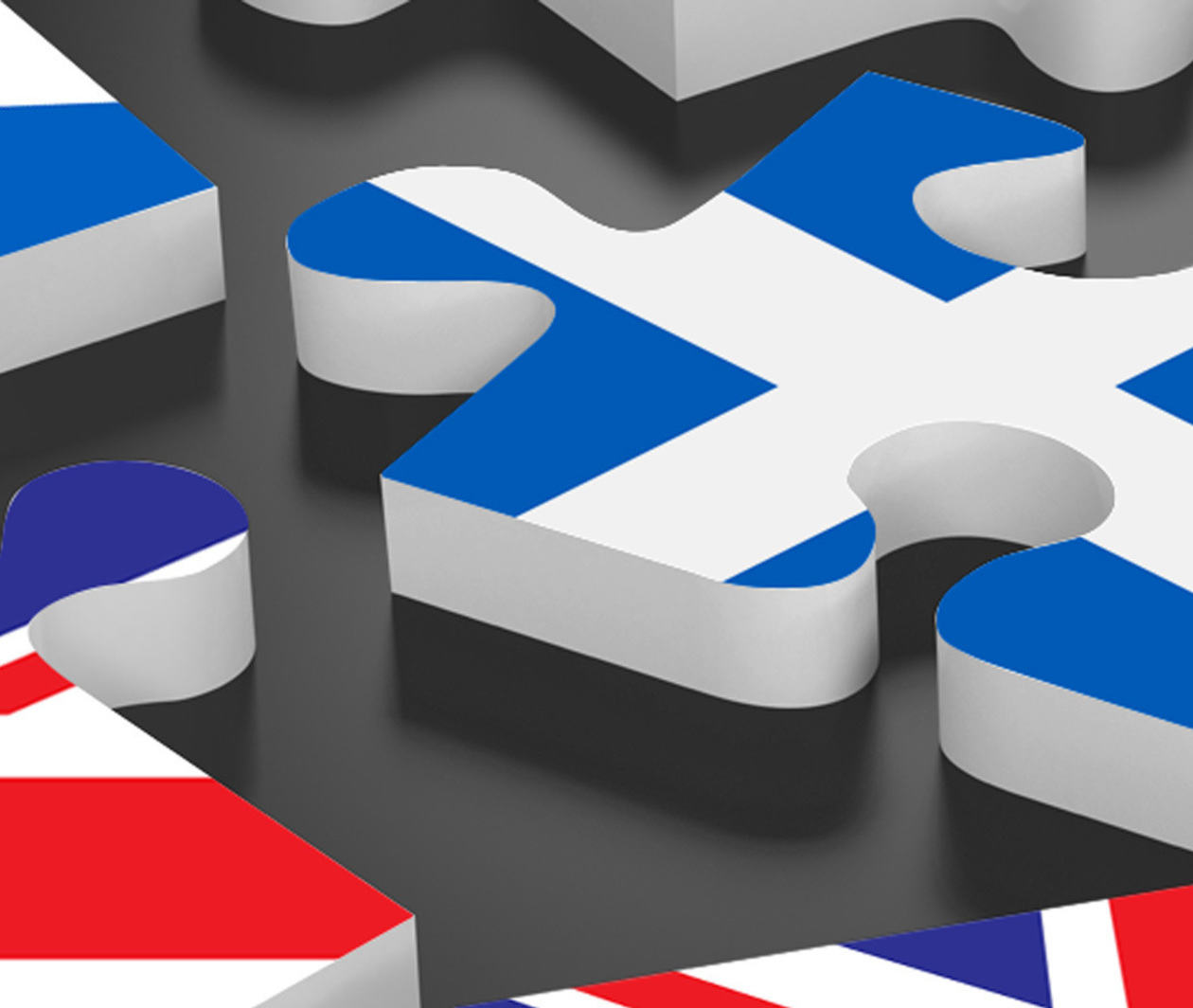 Jigsaw pieces with Scottish and UK flags