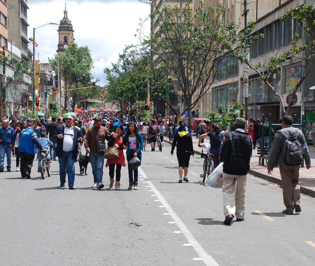 Photograph of street in Bogota with many pedestrians