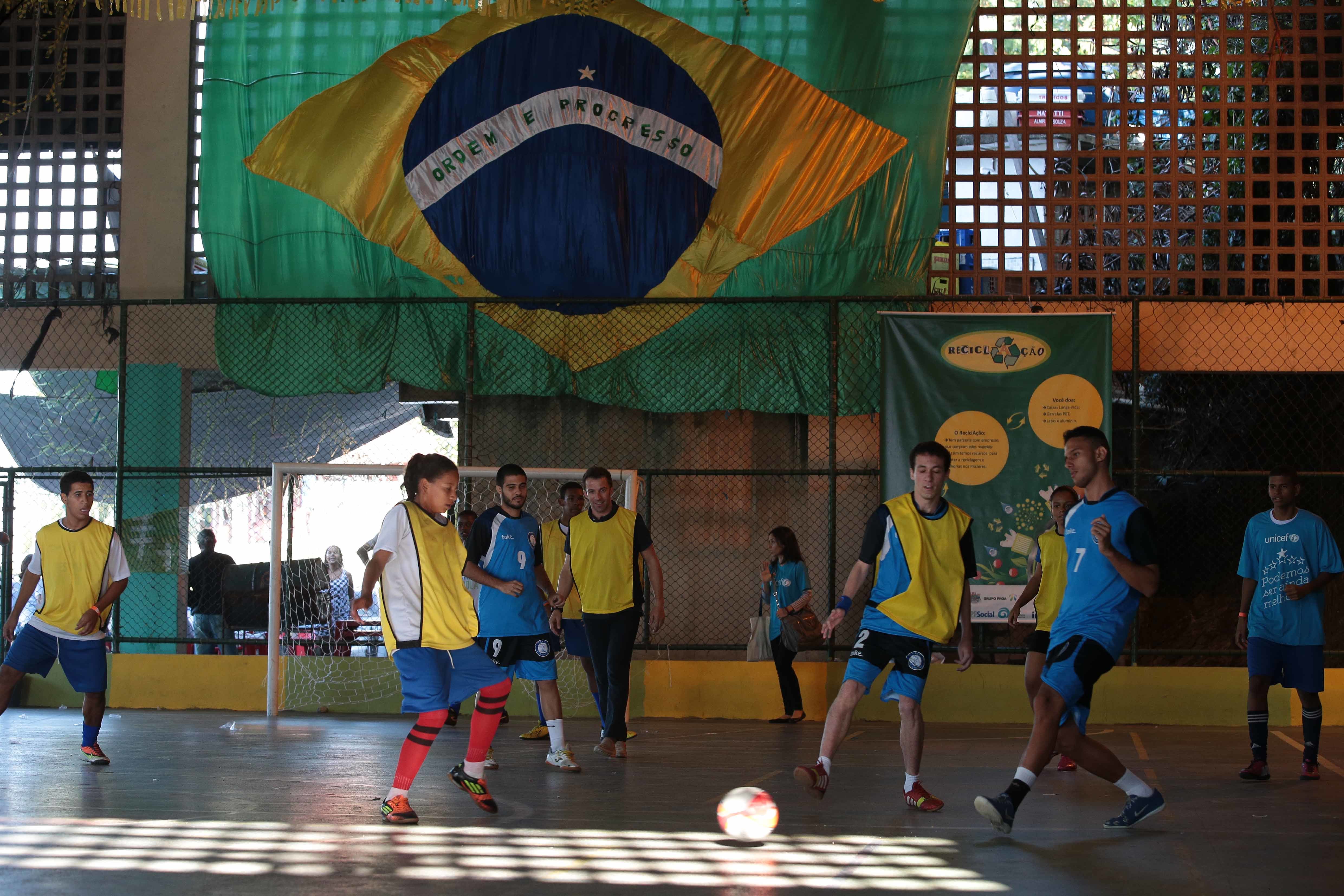 people playing indoor football at an event run by Save the Dream in Brazil