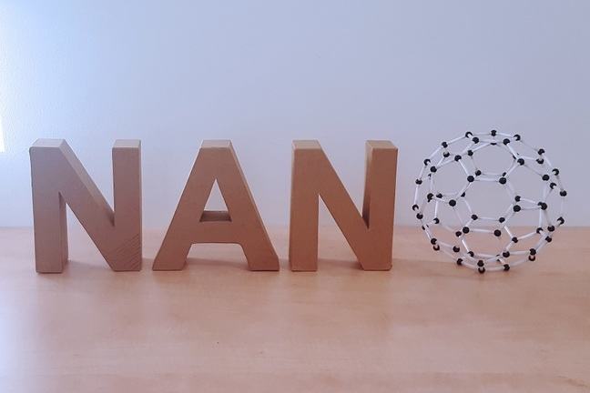 NANO: The letters NAN in 3D and the letter O as Buckey ball.