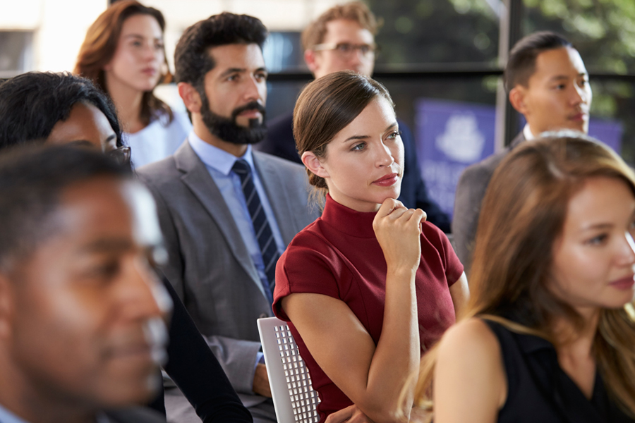 Group of people listening intently.