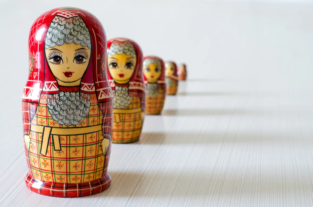 A set of matryoshka dolls representing an immersion into culture.