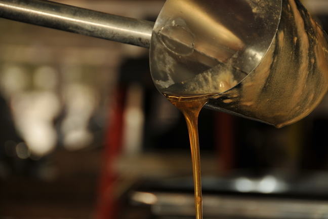 Honey Pouring from a Ladle