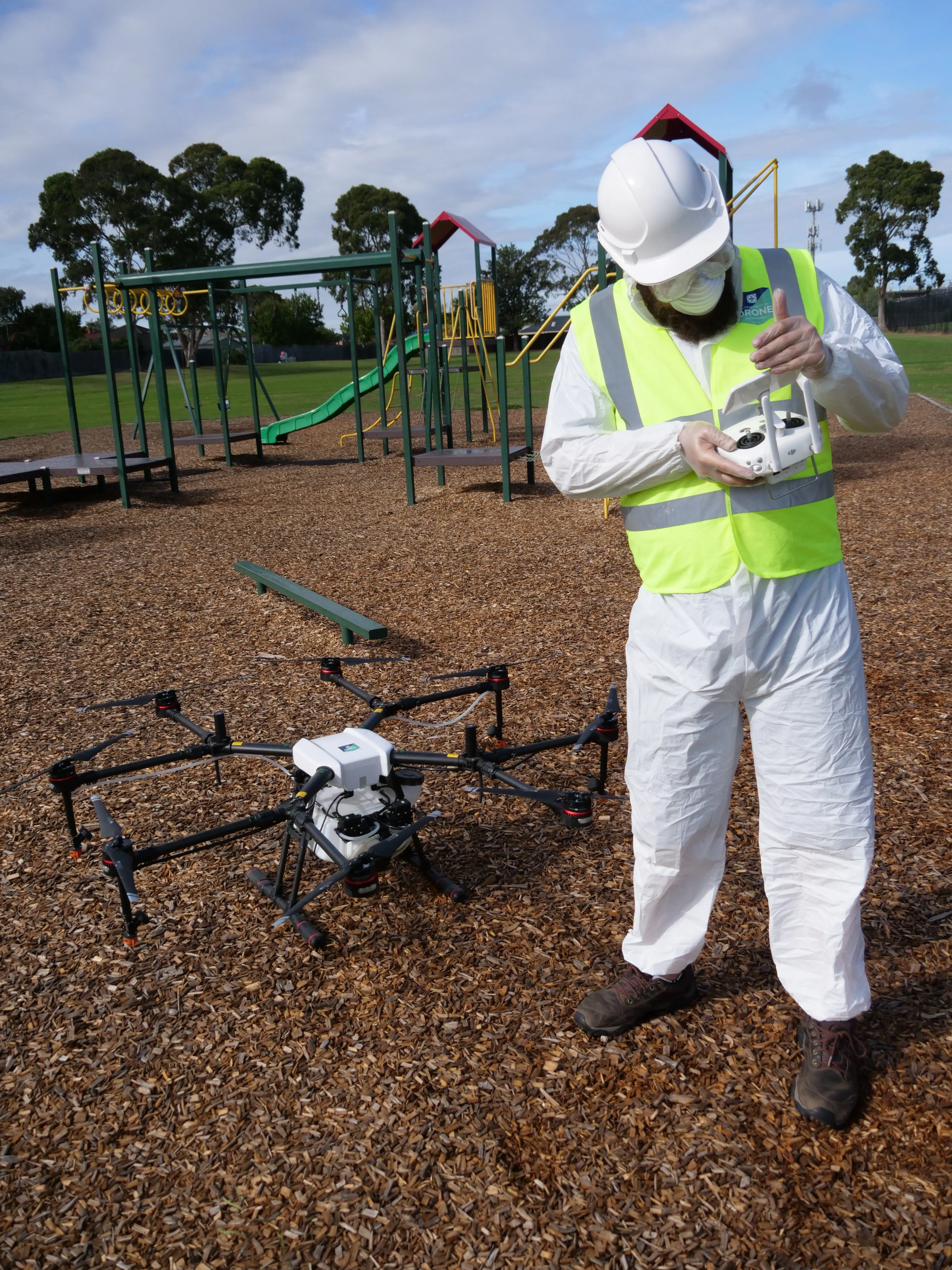 A person preparing to operate a drone