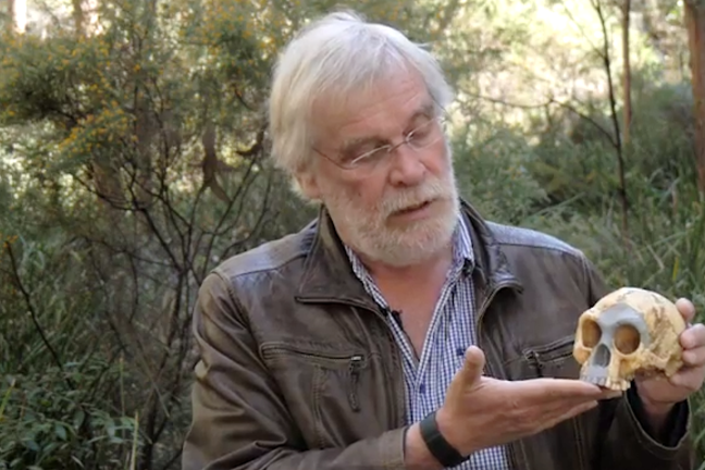 Professor Rainer Grün with a cast of H. floresiensis.