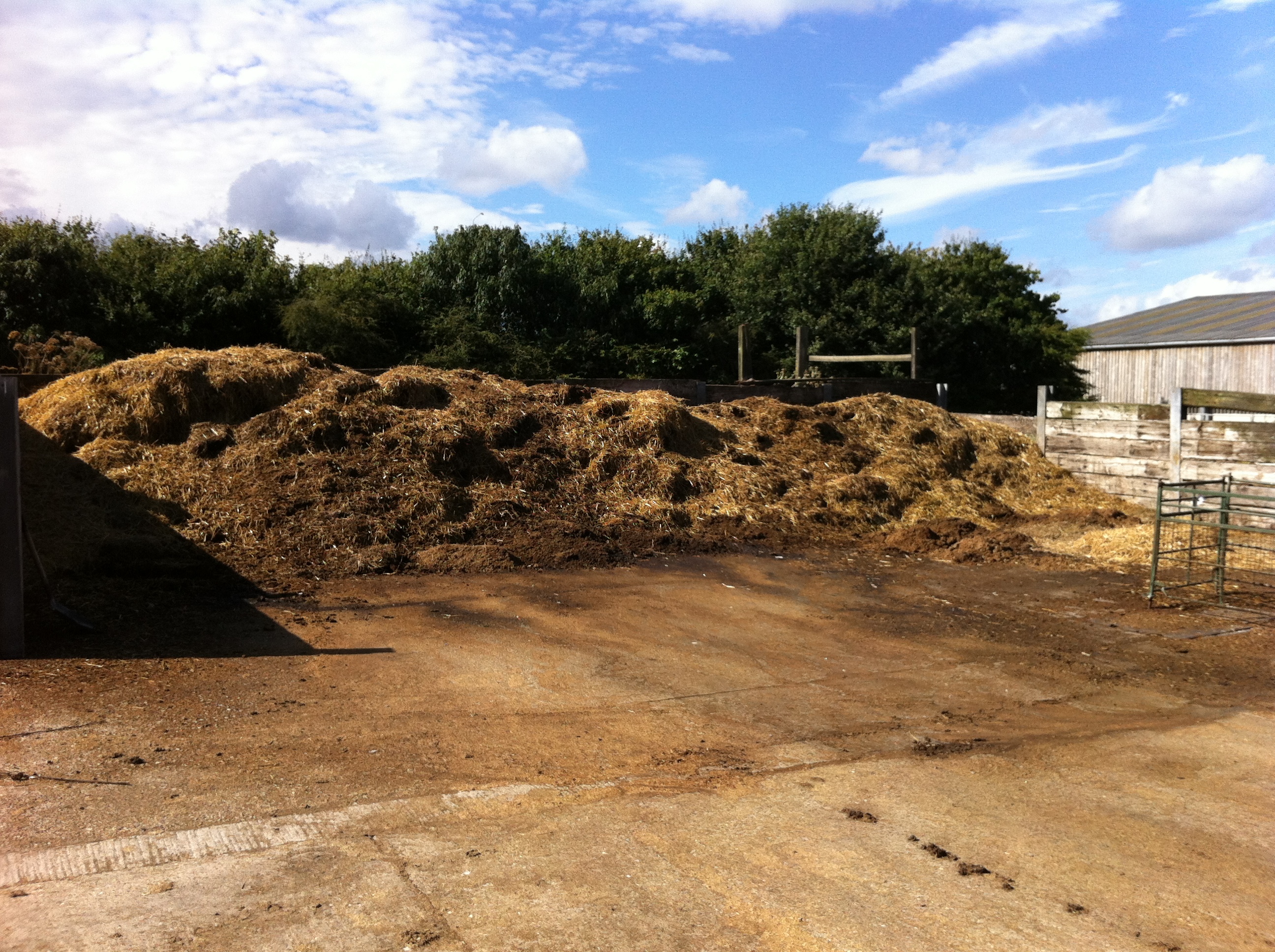 A photo of a large heap of manure