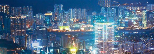 Image of Hong Kong skyline lit up at night