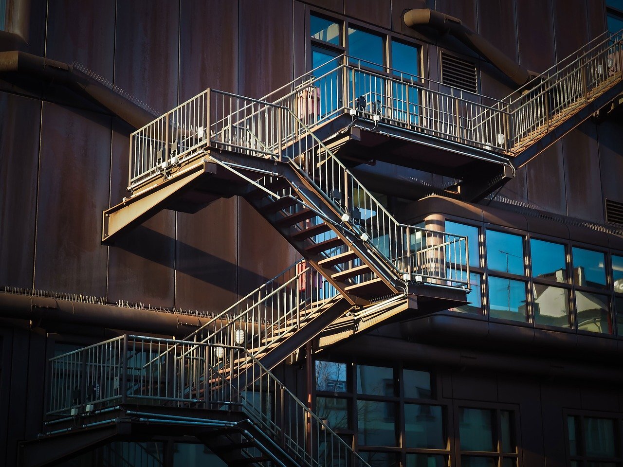 A finely structured external staircase going up several levels