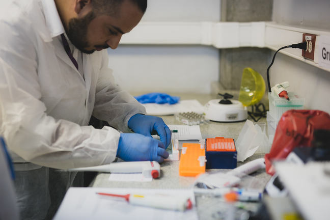 tbr Learner in the lab concentrating on work