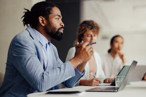 A boardroom filled with engaged directors