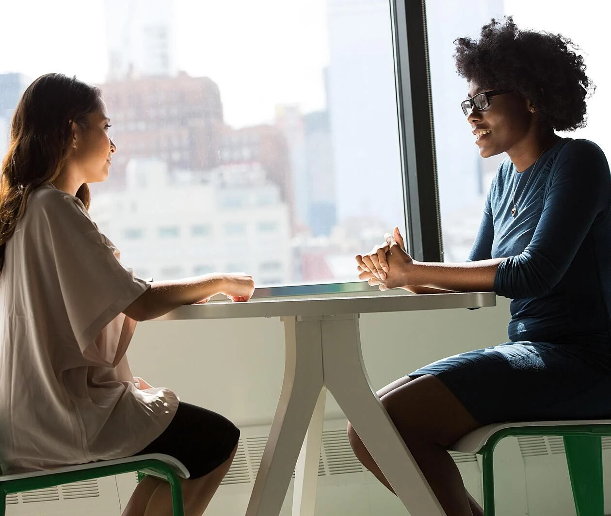 Two women talking