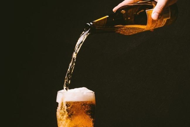 pouring a glass of beer