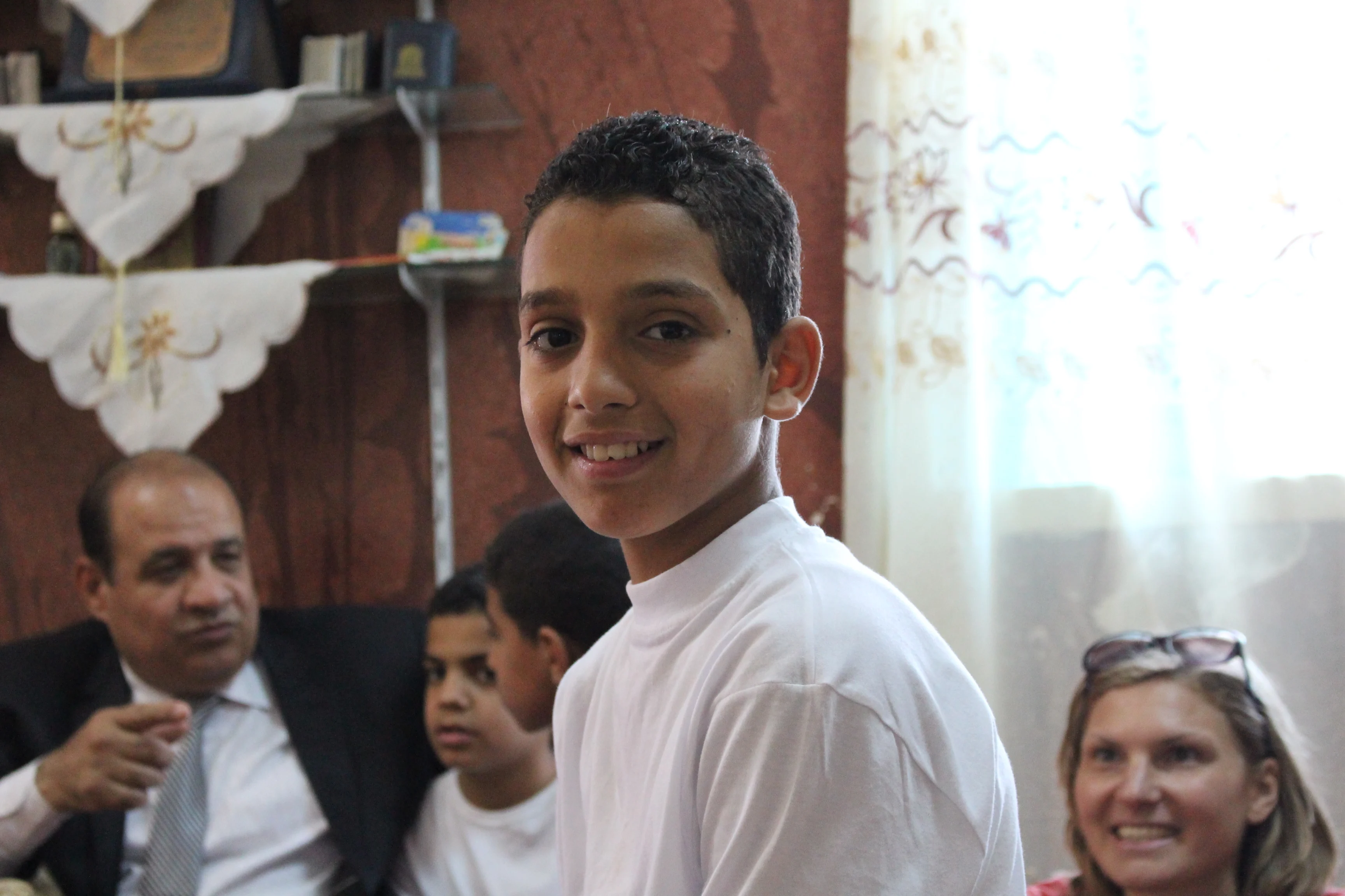 Arabic boy with father, mother and brothers.