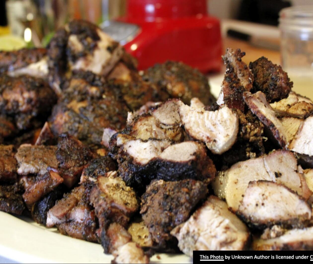 A place with pieces of well seasoned jerk chicken