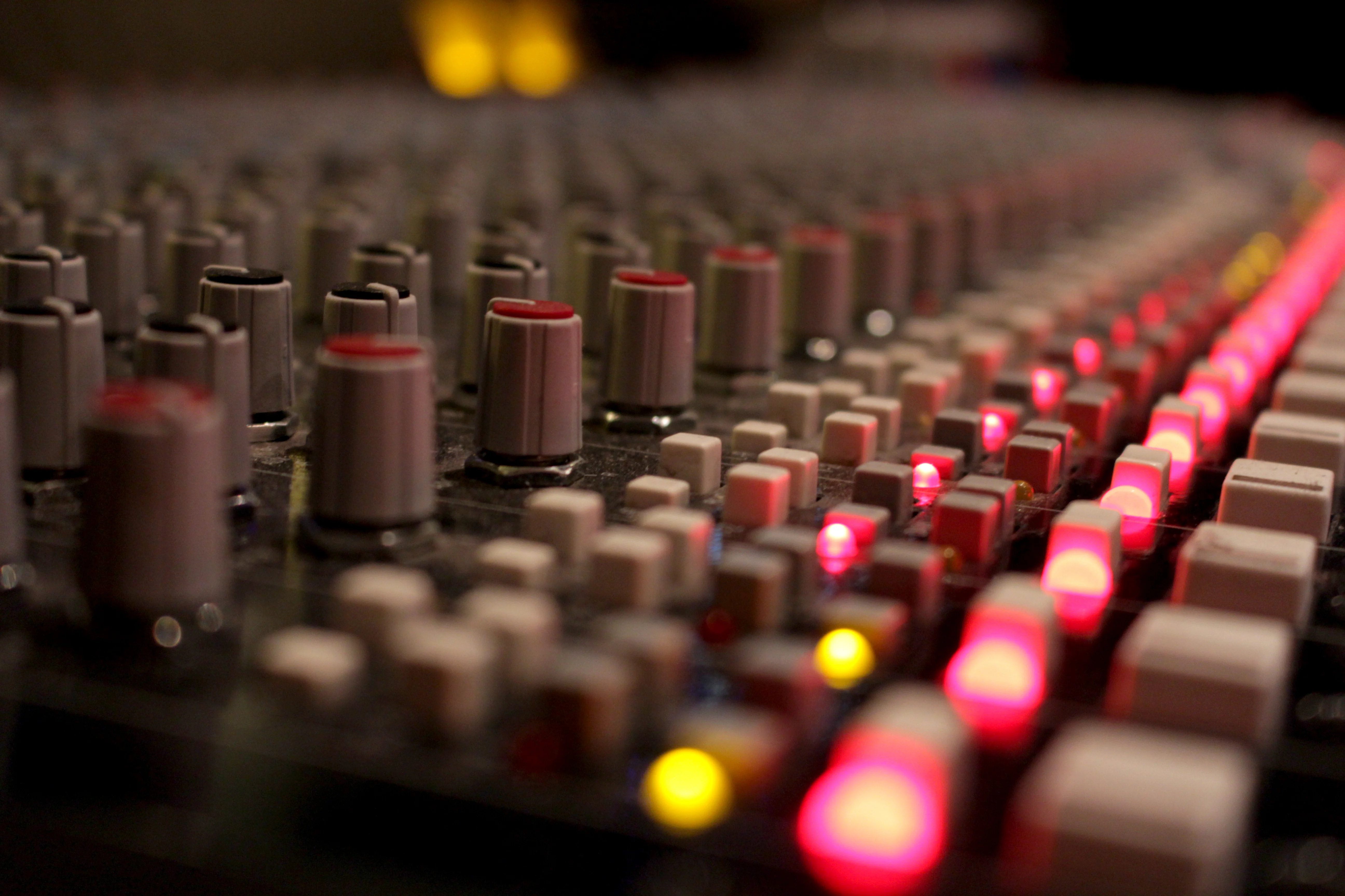 A mixing desk all lit up