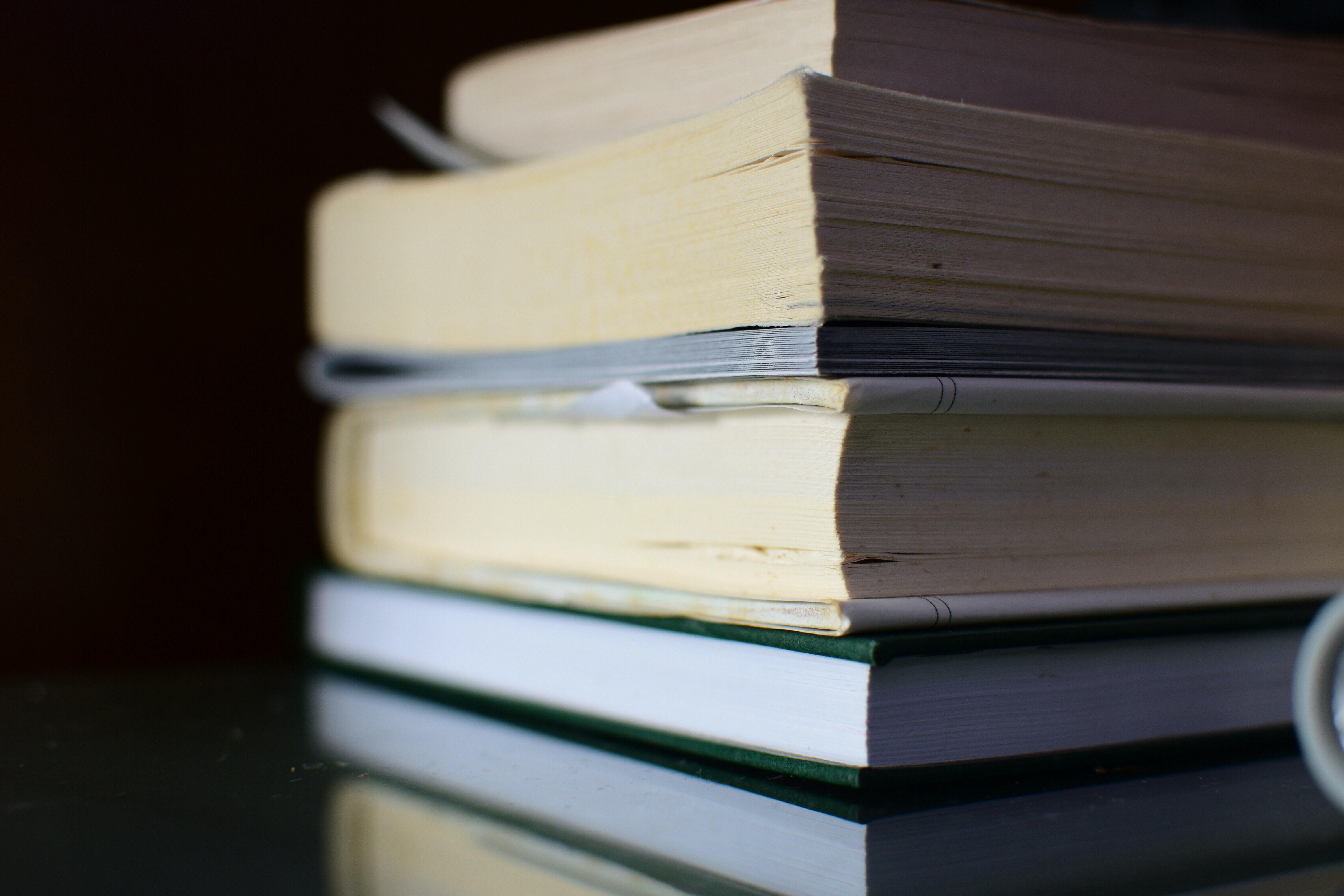 books stacked in a pile