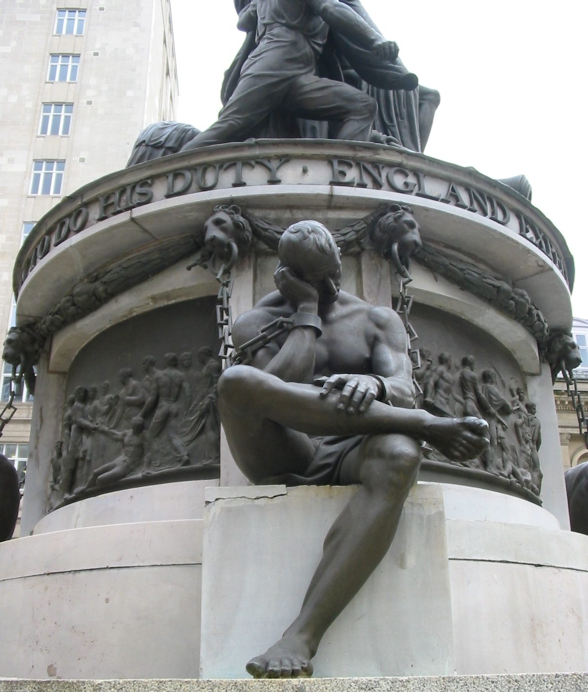 image of the base of Nelson Monument in Liverpool showing an enslaved person