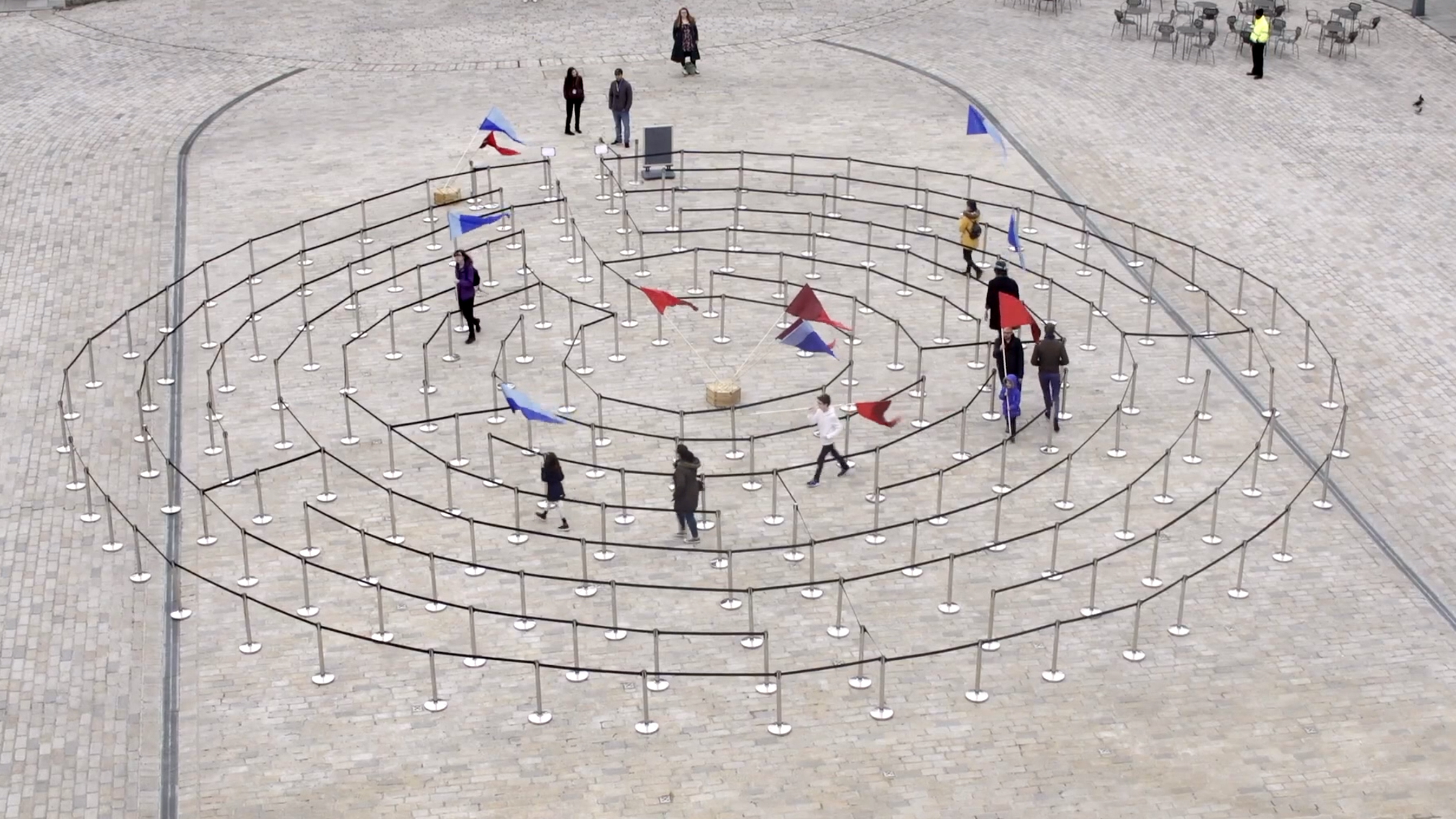 Outdoor game with people walking in a circular space