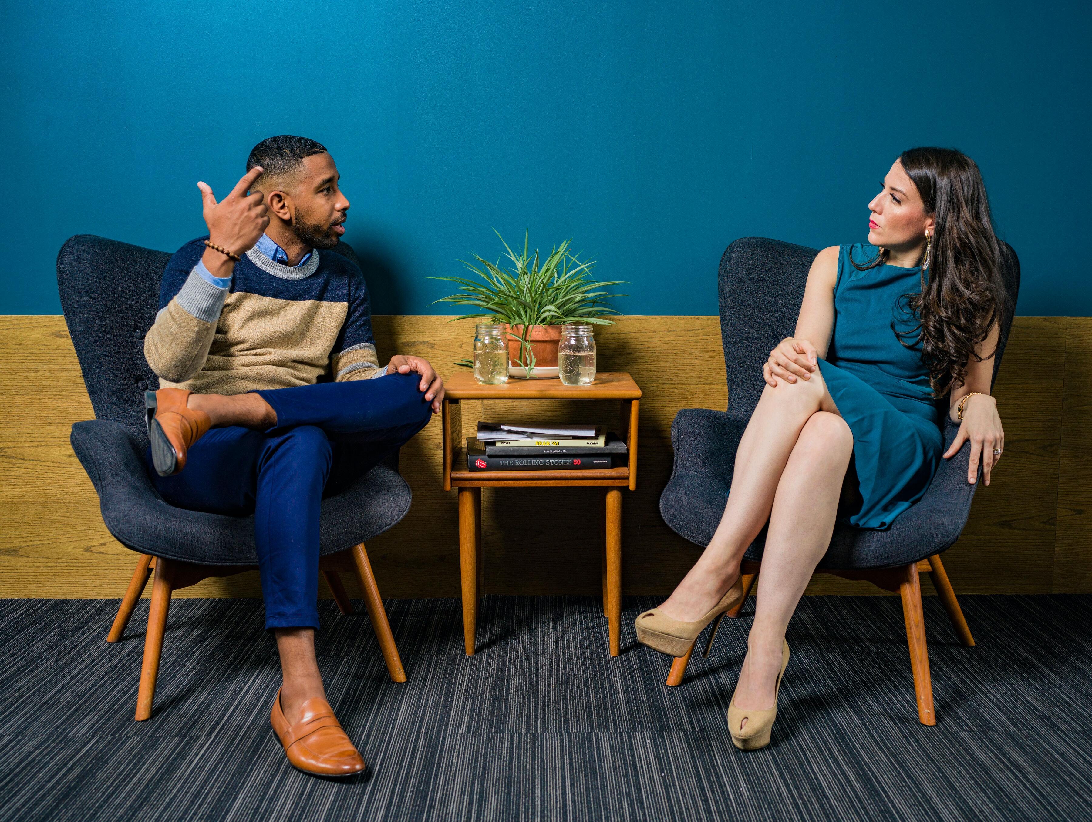 two people discussing something