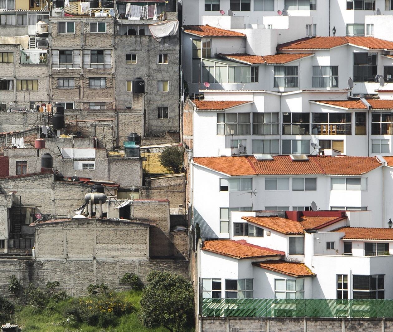 Socioeconomically disadvantaged housing juxtaposed against luxury accommodation