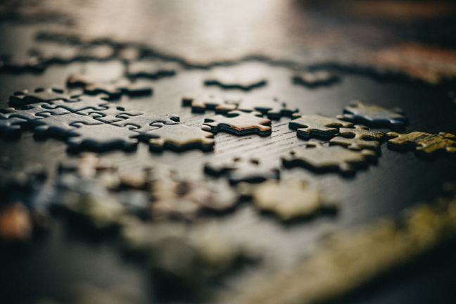 Puzzle pieces on a board