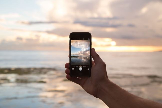 The sea viewed through the screen of a mobile phone.
