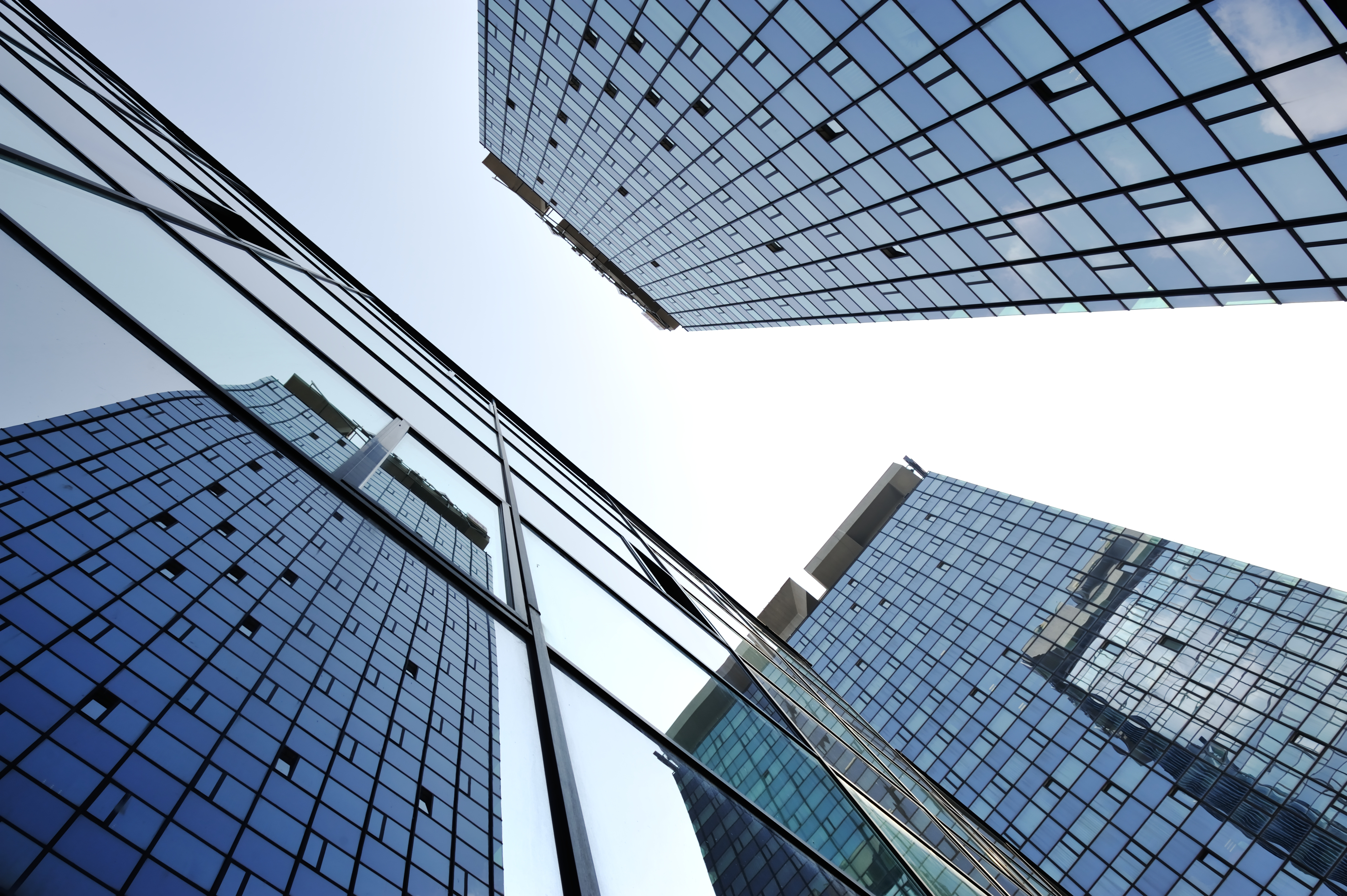 Looking up at high office buildings