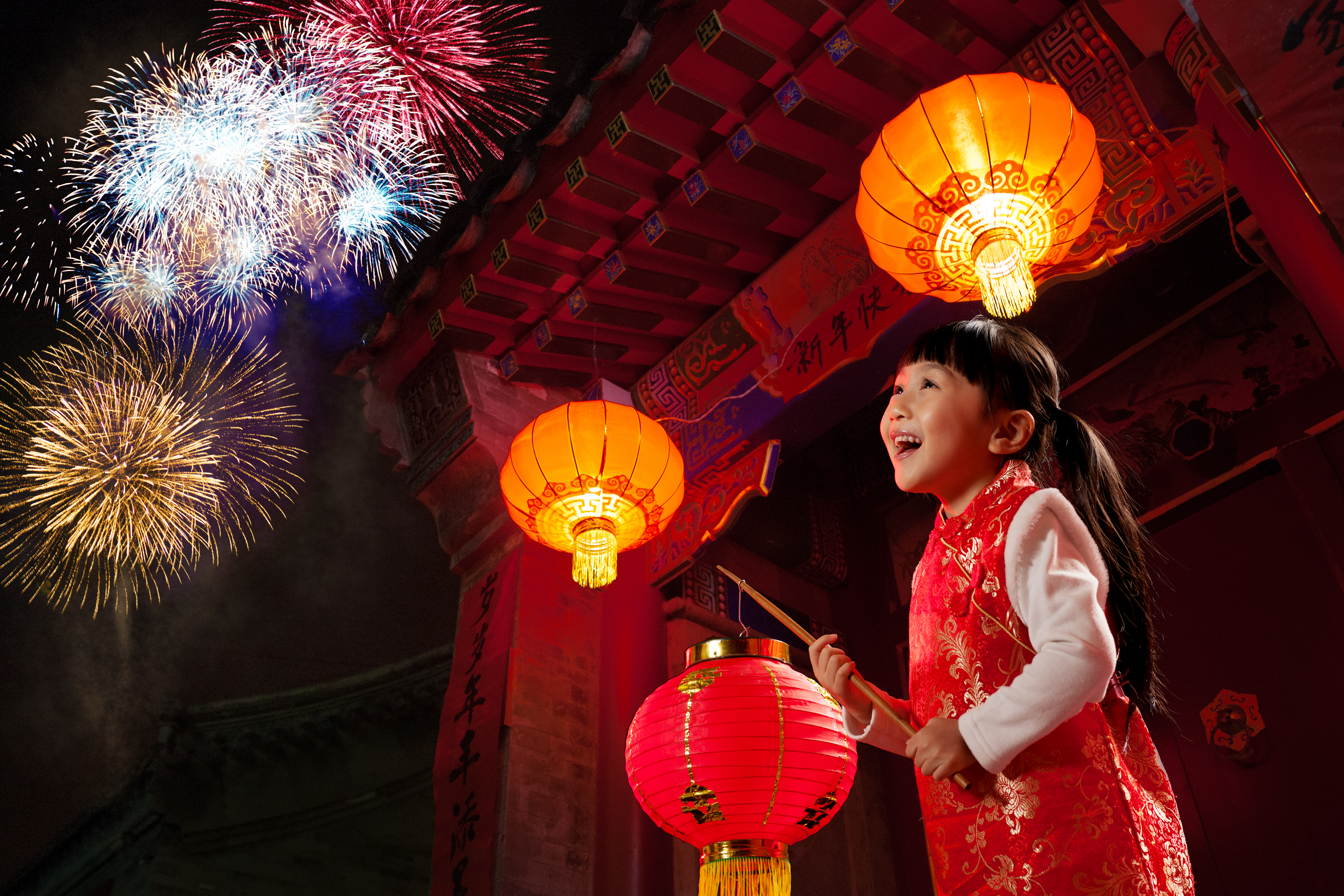 Girl on stage with Chinese lanterns