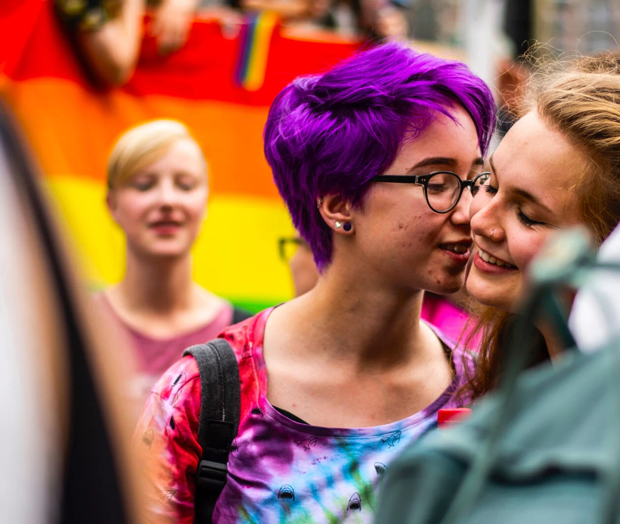 Young person with purple hair 