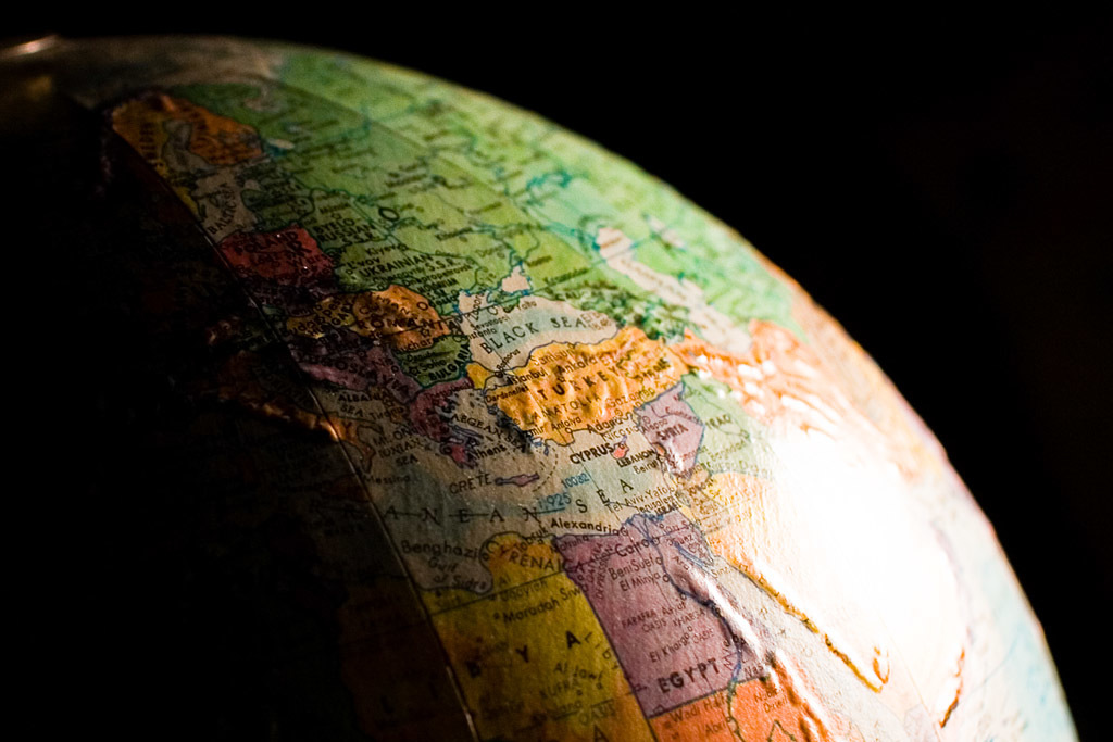 close up of globe, with dark background