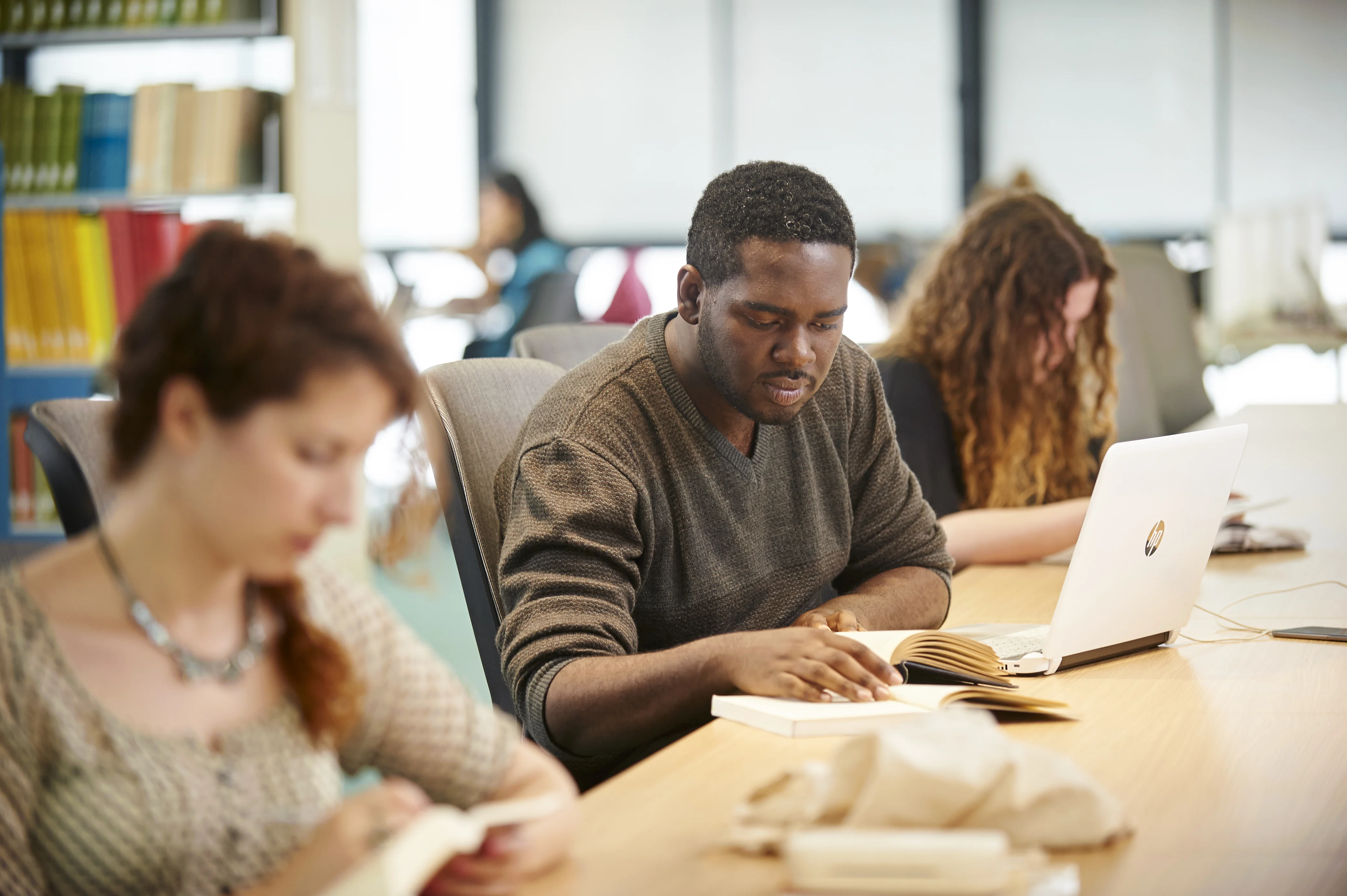 student studying in the library