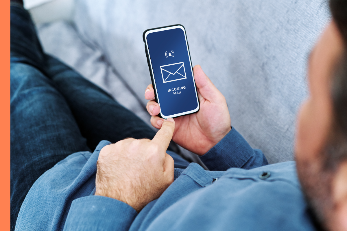 Man receiving email on cellphone