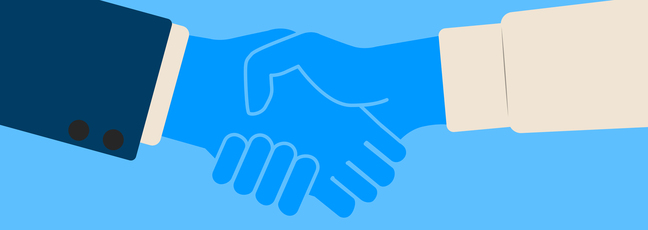 Two people shaking hands after the interview