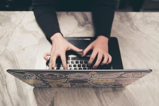 Person typing.