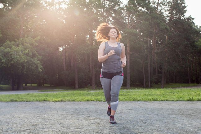obese woman jogging