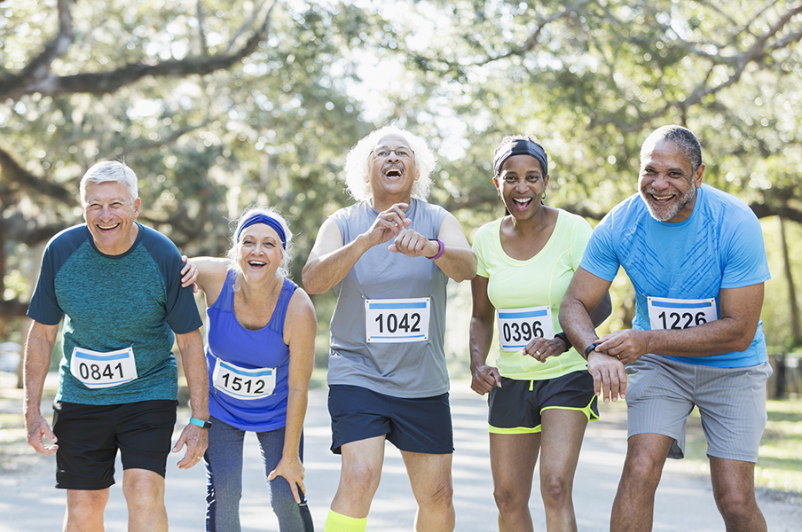 Mature runners five older mixed race runners