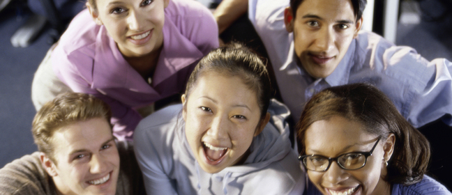 A group of five young people looking up into the camera