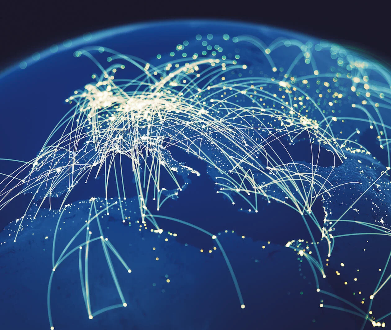 Image of the globe with countries being connected via illuminated lines