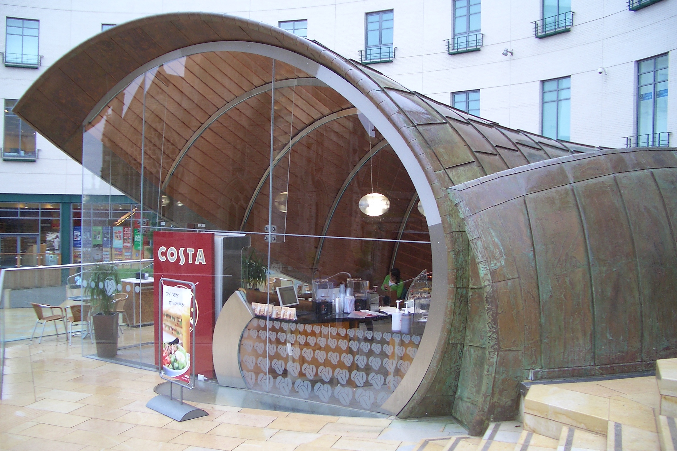 A cafe at the edge of a public space